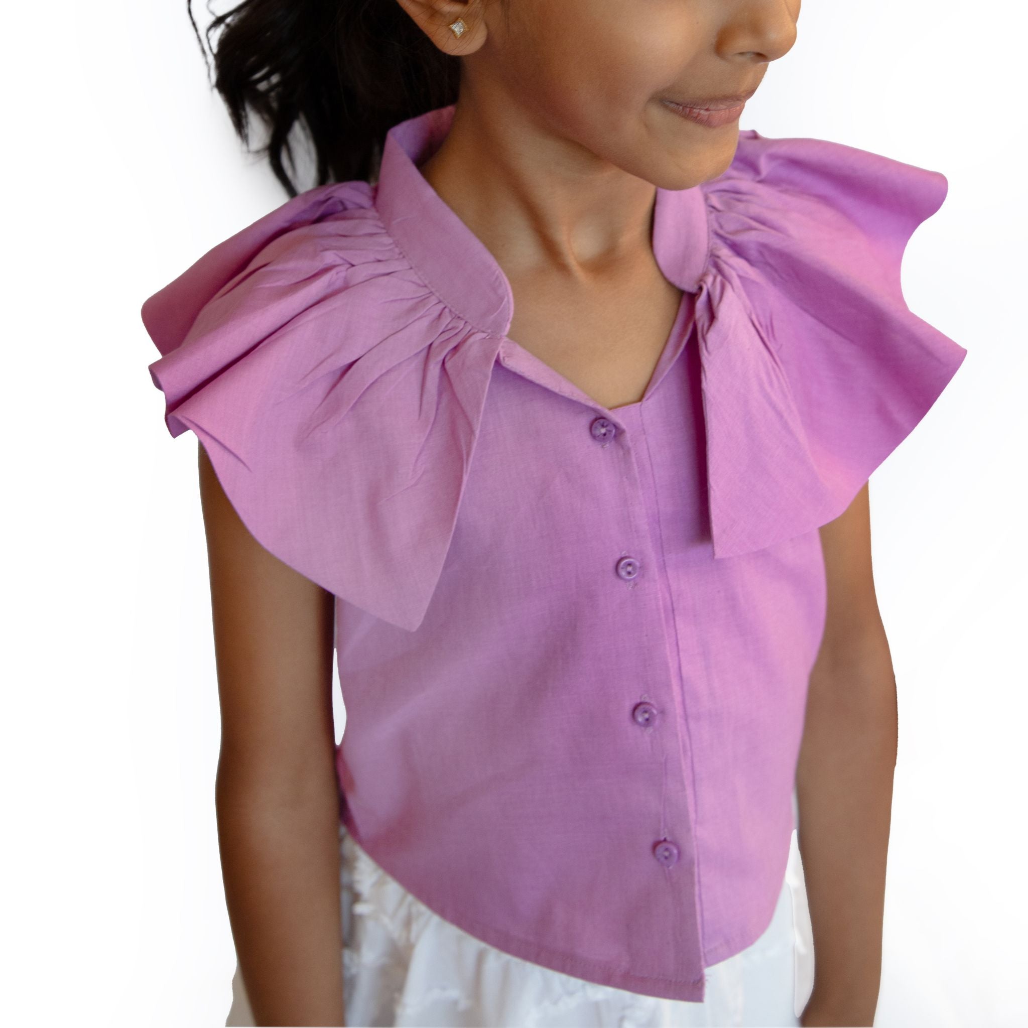 Girl wearing Mauve Cotton sleeveless crop top with frill and front button opening