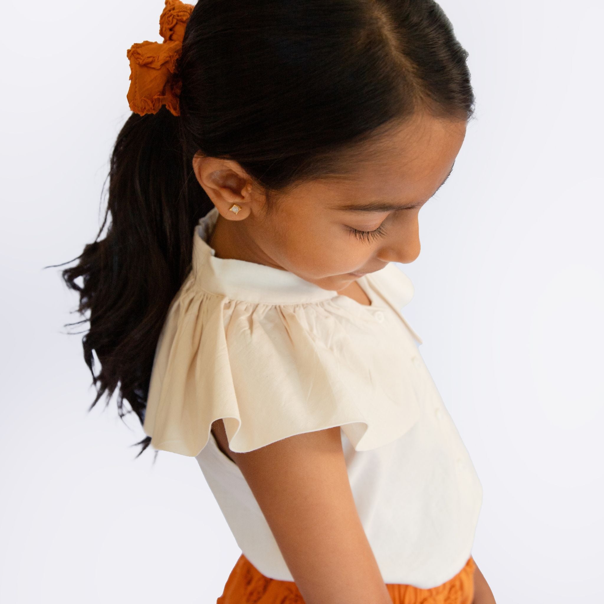 The Riva Cream Top